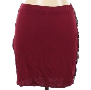 Pretty Little Thing Skirt NWT. Burgundy with Black & Silvertone embellishments.